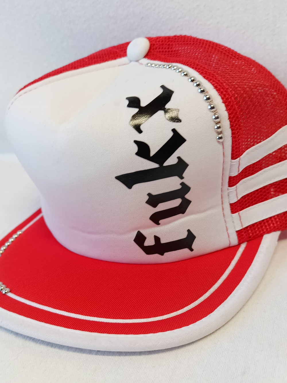 Red & White Trucker Cap with Vintage Tri-Side-Stripe Gothic Text and Stud Accent